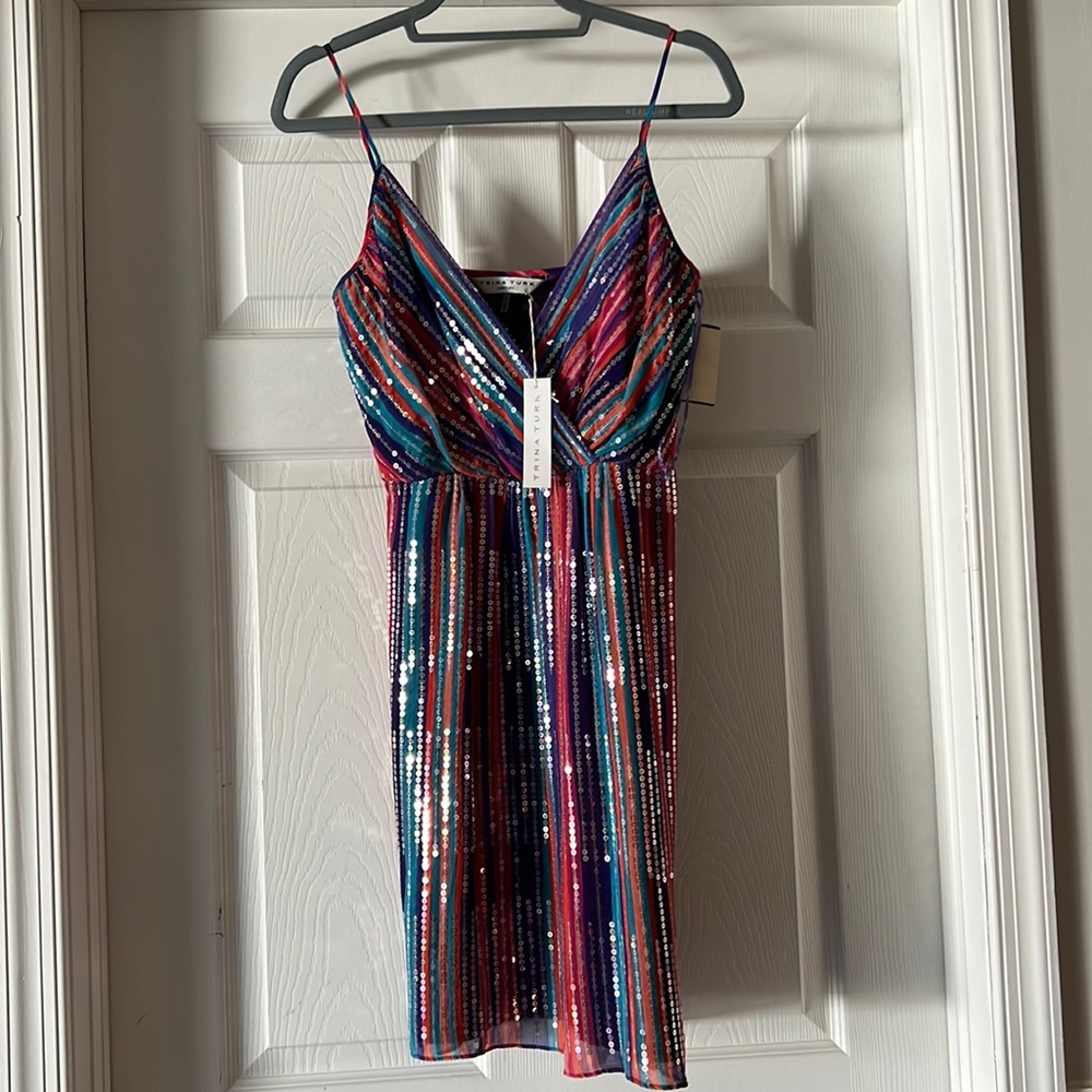 Sequined multi-color cocktail dress with adjustable straps.
